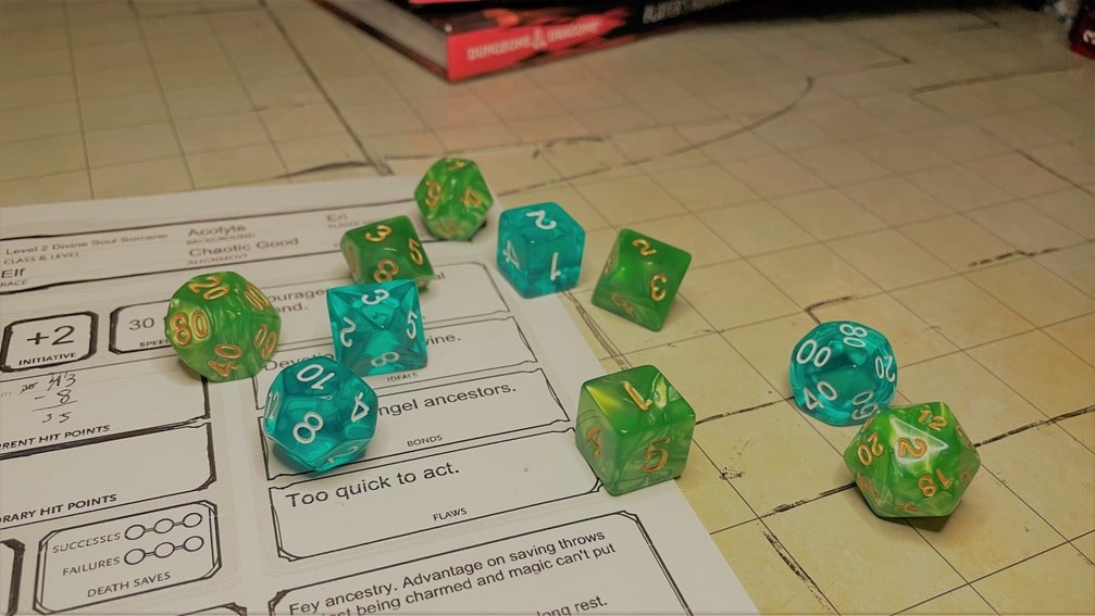D&D 5e character sheet and dice